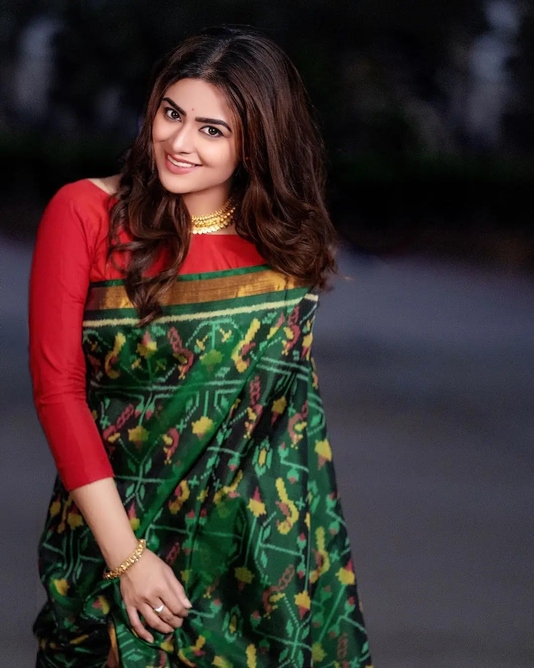 Priyanka Sharma Stills In Green Saree Red Blouse